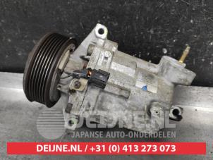 Gebruikte Pomp Airco Nissan Micra C+C (K12) 1.6 16V Prijs € 50,00 Margeregeling aangeboden door V.Deijne Jap.Auto-onderdelen BV