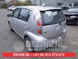 Daihatsu Sirion Achterlicht links O670554 foto 3