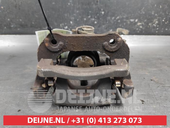 Suzuki Swift Bremszange links hinten O670776