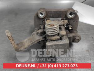 Suzuki Swift Bremszange links hinten O670776 foto 2