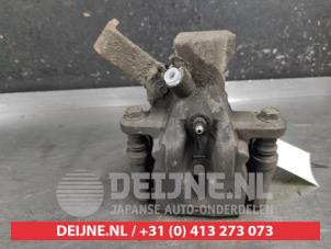Suzuki Swift Bremszange links hinten O670776 foto 3