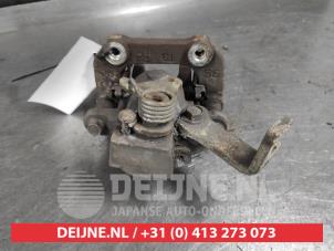 Suzuki Swift Rear brake calliper, right O670777 photo 2