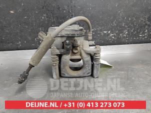 Mazda 3 Remklauw (Tang) links-achter O670905 foto 3
