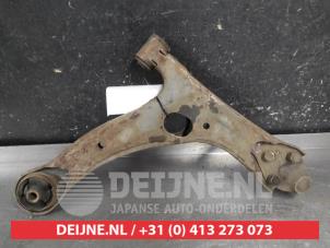 Toyota Corolla Verso Draagarm onder links-voor O671056 foto 2