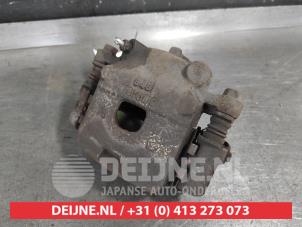 Daihatsu Cuore Remklauw (Tang) rechts-voor O671251 foto 2