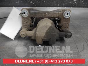 Kia Sorento Rear brake calliper, left O671680 photo 2