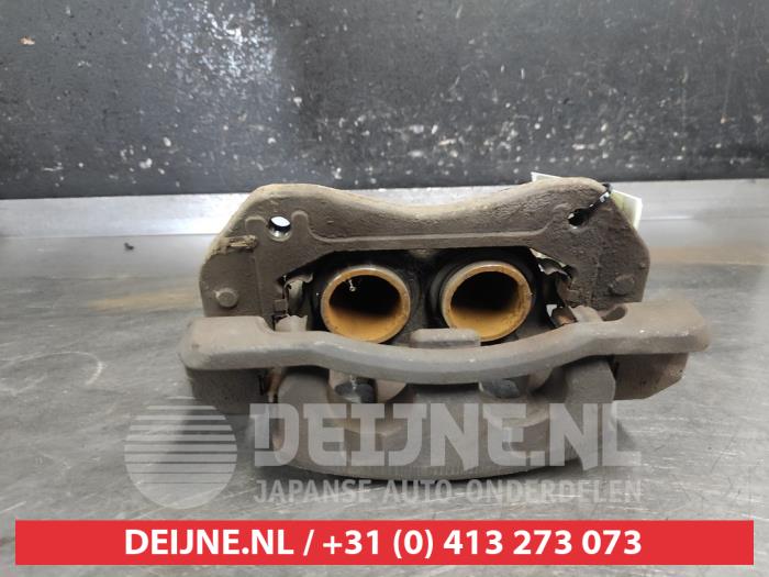 Kia Sorento Front brake calliper, left O671677