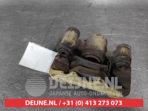 Toyota Celica Bremszange links hinten O672530 foto 2