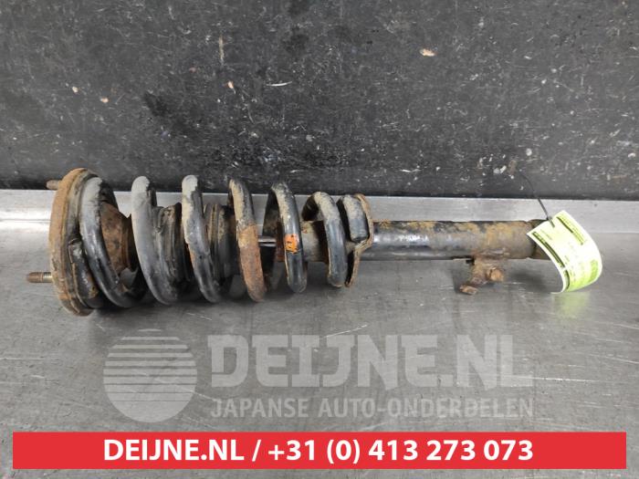 Mitsubishi L200 Stoßdämpferstrebe links vorne O672607