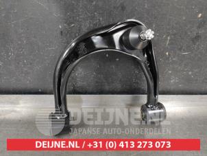 Toyota Landcruiser Querlenker oben links vorne O672944 foto 2