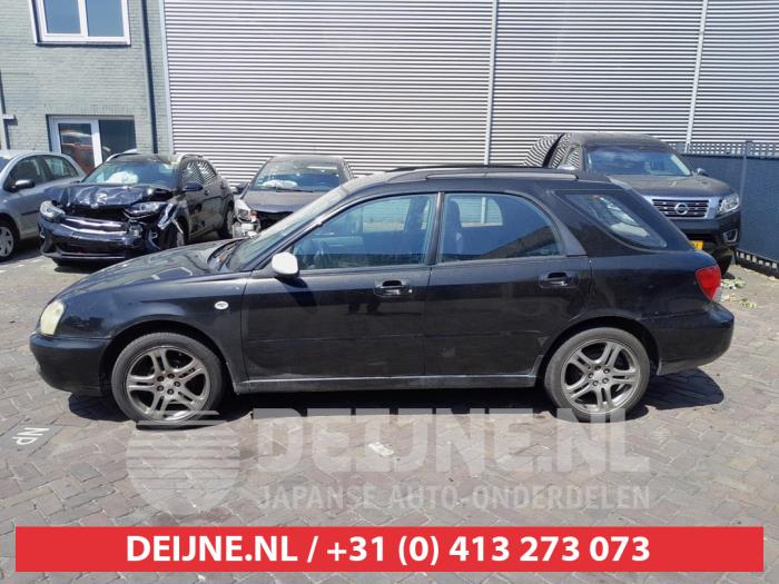 Subaru Impreza Türscheibe 4-türig links hinten O673250