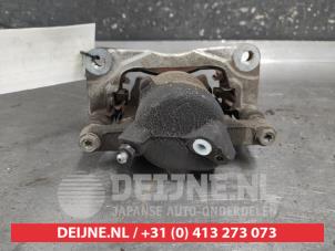 Suzuki Swift Front brake calliper, right O673447 photo 2