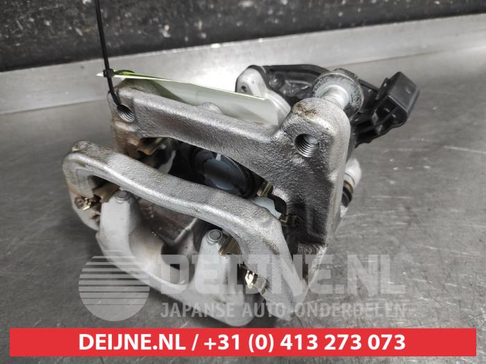 Nissan X-Trail Rear brake calliper, left O673576