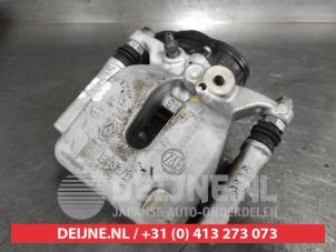 Nissan X-Trail Bremszange links hinten O673576 foto 2