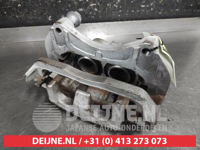 Nissan X-Trail Front brake calliper, left O673582