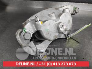 Nissan X-Trail Bremszange links vorne O673582 foto 3