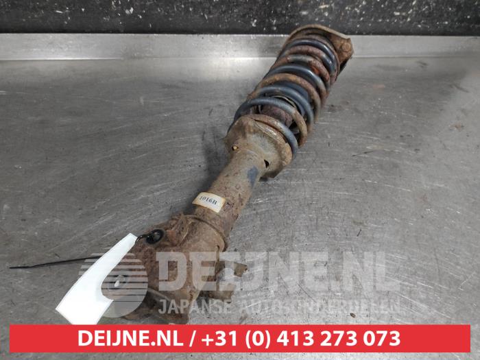 Suzuki Wagon R+ Front shock absorber rod, left O675721