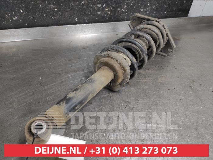 Nissan Almera Tino Schokdemperpoot rechts-achter O675864