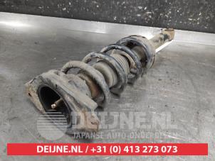 Nissan Almera Tino Schokdemperpoot rechts-achter O675864 foto 2