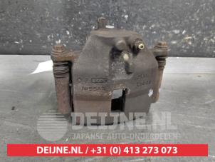 Nissan Almera Tino Front brake calliper, left O675866 photo 3