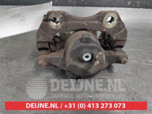 Nissan Almera Tino Front brake calliper, right O675867 photo 2