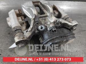 Toyota Yaris Bremszange rechts hinten O675953 foto 3