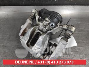 Toyota Yaris Bremszange rechts hinten O675953 foto 2