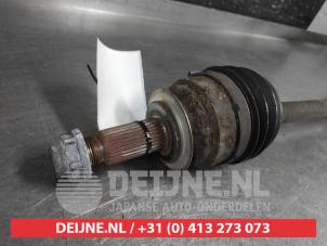 Subaru Impreza Aandrijfas links-voor O676135 foto 2