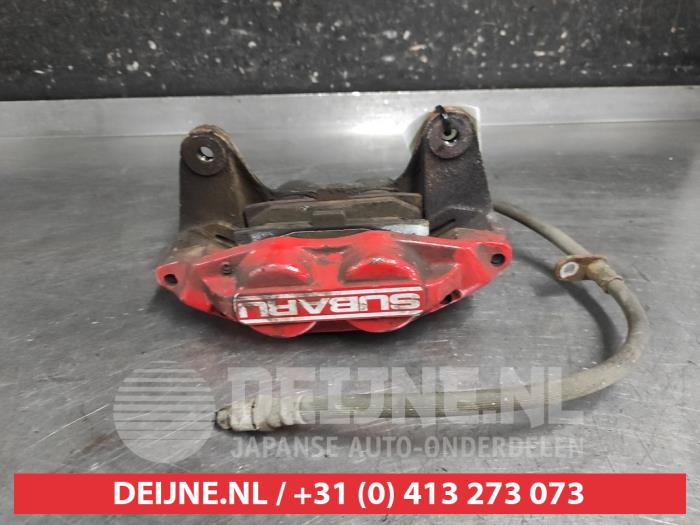 Subaru Impreza Remklauw (Tang) links-voor O676138