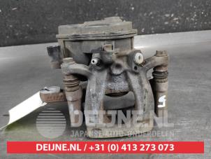 Nissan Leaf Remklauw (Tang) links-achter O676156 foto 3