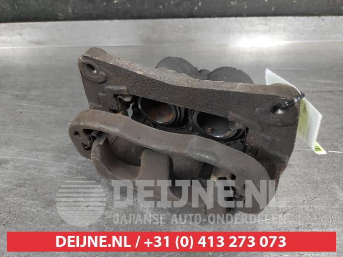 Subaru Legacy Front brake calliper, left O676291