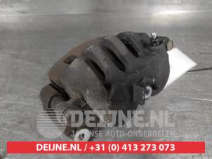 Subaru Legacy Bremszange links vorne O676291 foto 3