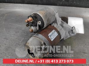 Subaru Outback Startmotor O676892 foto 2