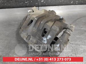 Toyota Rav-4 Bremszange links vorne O677068 foto 2