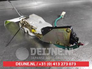 Mazda Demio Door lock mechanism 4-door, front left O677499 photo 2