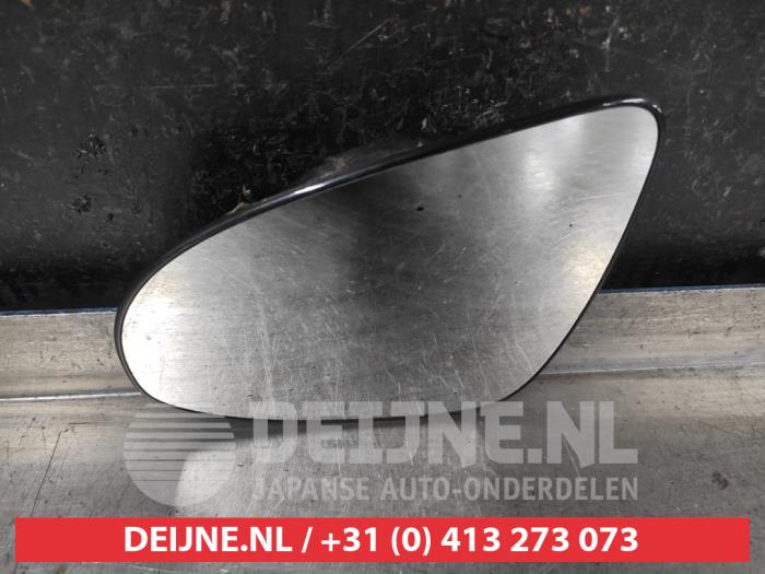 Toyota Aygo X Spiegelglas links O677599