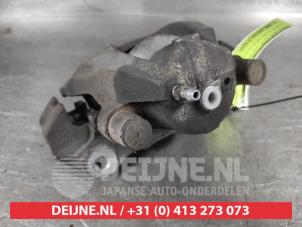 Toyota Aygo X Front brake calliper, left O677657 photo 3