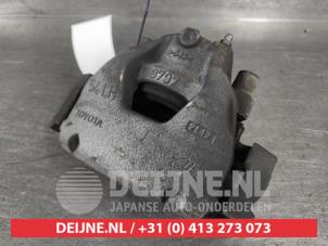 Toyota Aygo X Front brake calliper, left O677657 photo 2