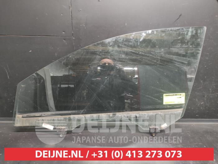 Kia Sportage Door window 4-door, front left O680045