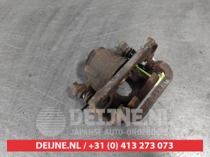 Nissan Qashqai Rear brake calliper, left O680450 photo 2