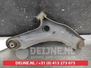 Suzuki Celerio Draagarm onder links-voor O680889 foto 2