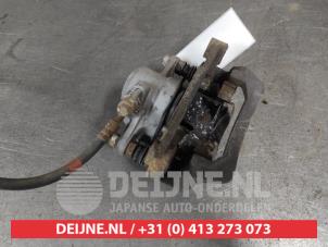 Subaru Forester Rear brake calliper, right O682229 photo 2