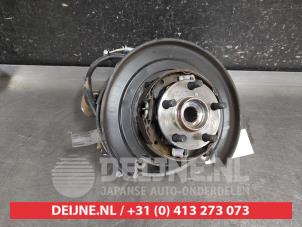 Subaru Forester Achsschenkel links hinten O682230 foto 2