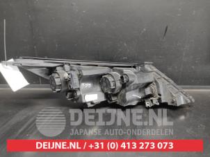Kia Sportage Scheinwerfer links O682374 foto 2