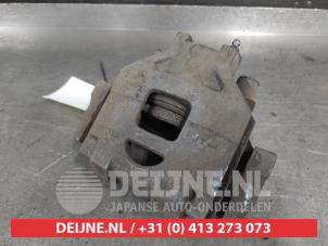 Toyota Yaris Front brake calliper, left O682730 photo 2