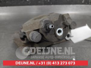 Toyota Yaris Front brake calliper, left O682730 photo 3