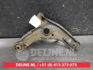 Toyota Yaris Querlenker unten links vorne O683432 foto 2