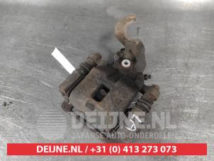 Hyundai I10 Rear brake calliper, left O684123 photo 2