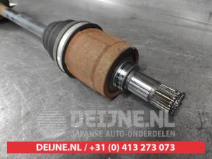 Honda Jazz Aandrijfas links-voor O684569 foto 3