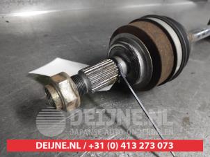 Honda Jazz Aandrijfas links-voor O684569 foto 2